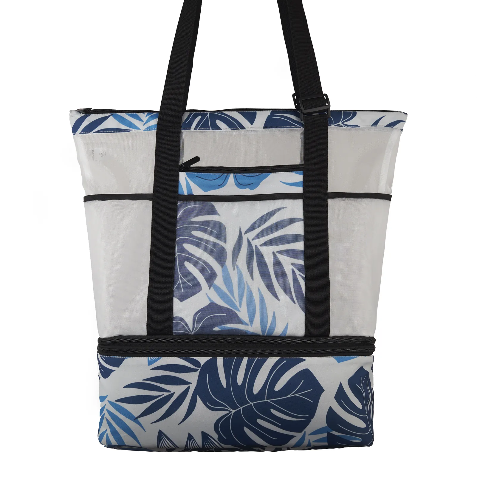Packshot of a mesh beach tote with palm print on white