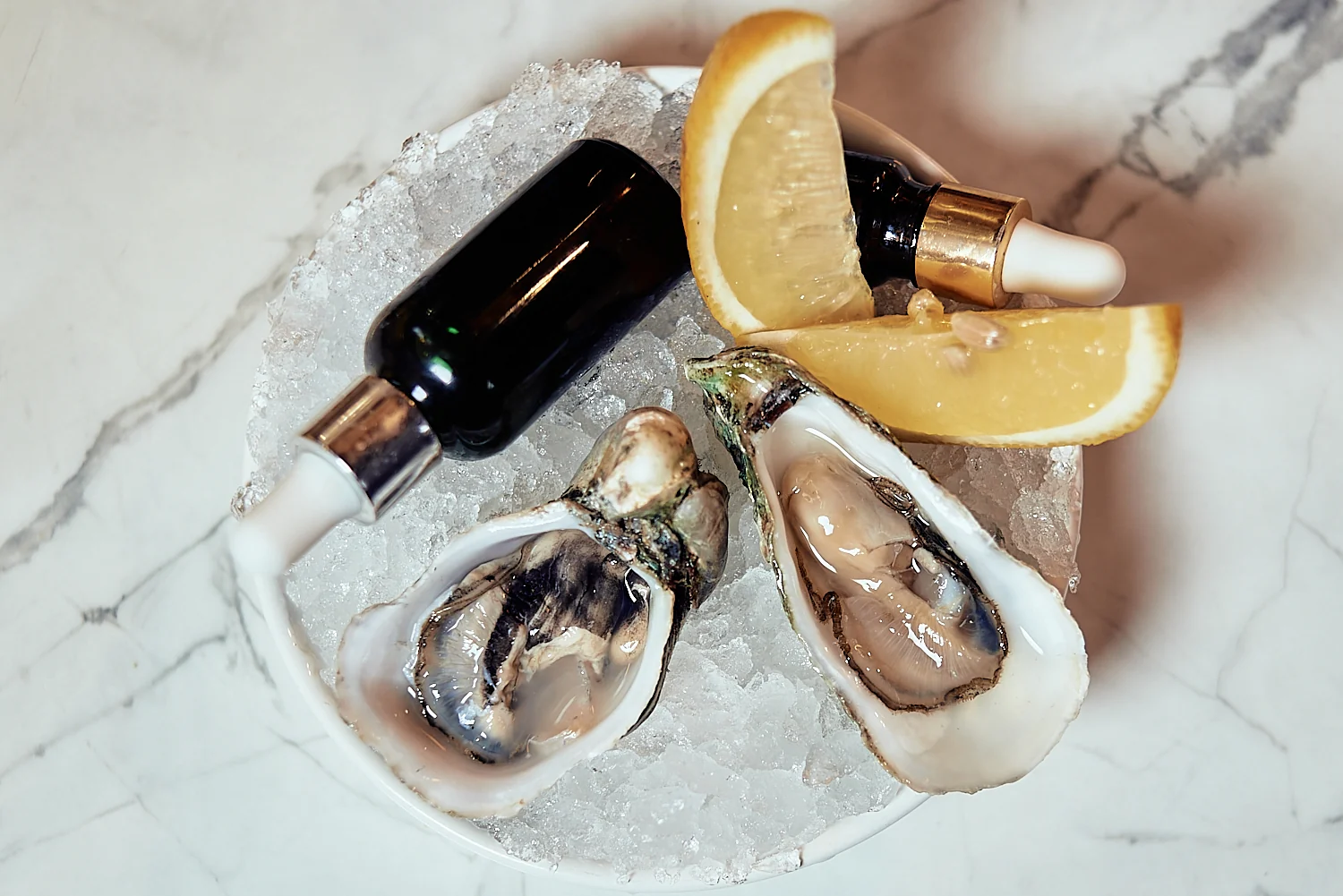 Oysters on ice with lemon, restaurant food styling