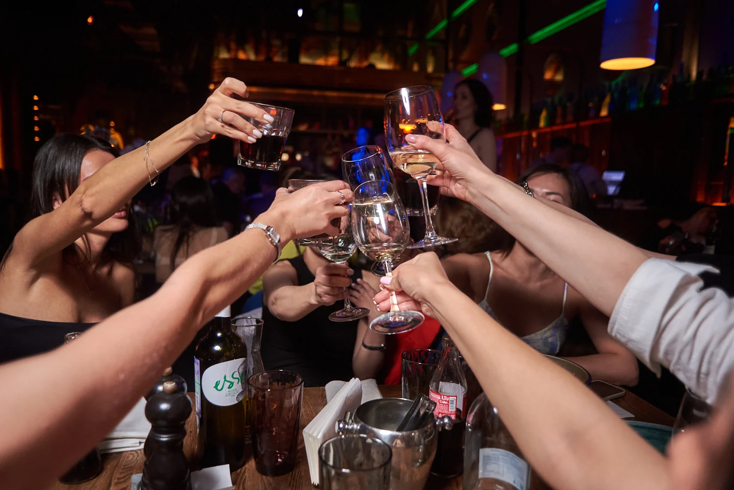 Guests raising glasses for a toast
