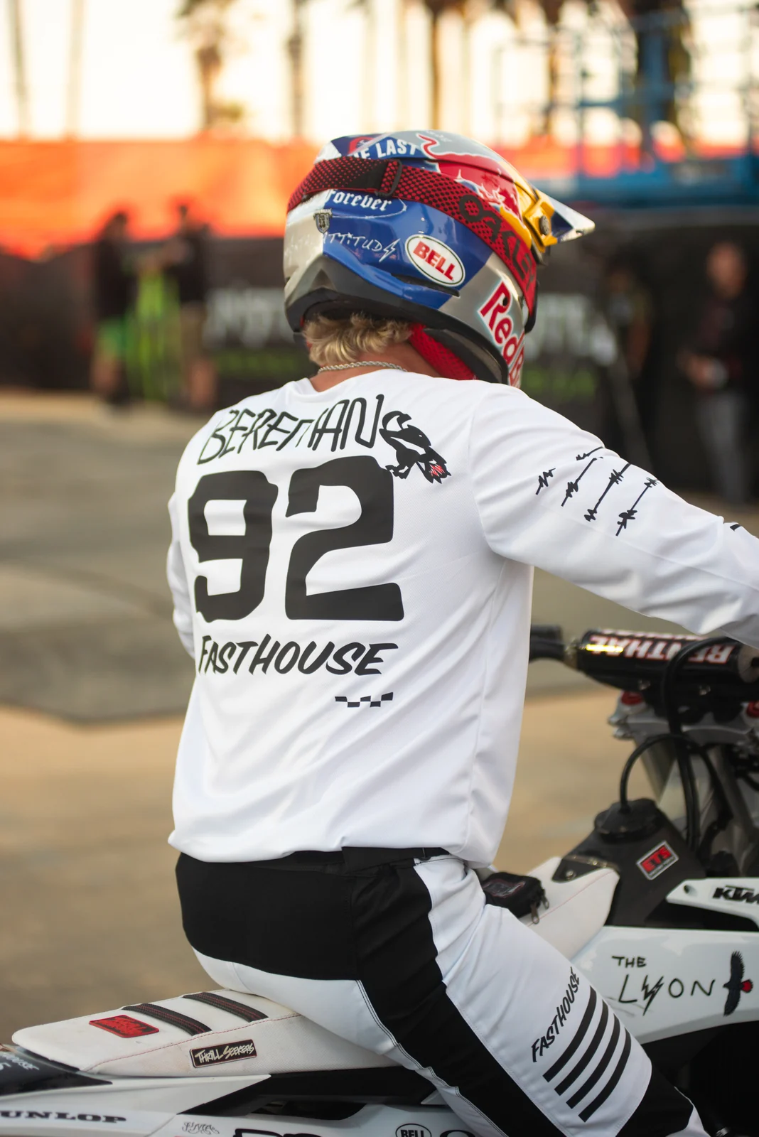 Moto X rider with helmet and number 92 before a run
