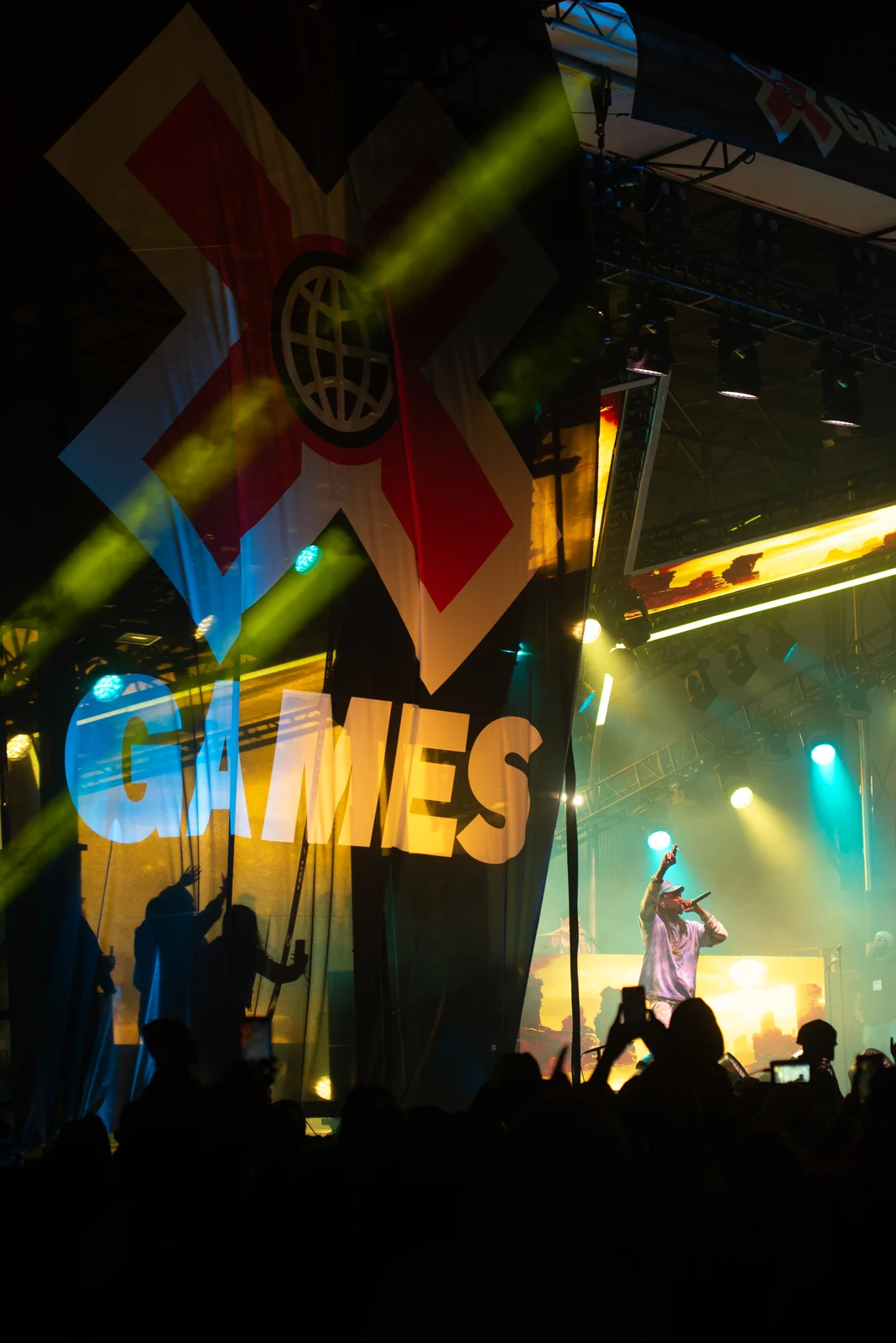 Festival stage lights behind the X Games logo