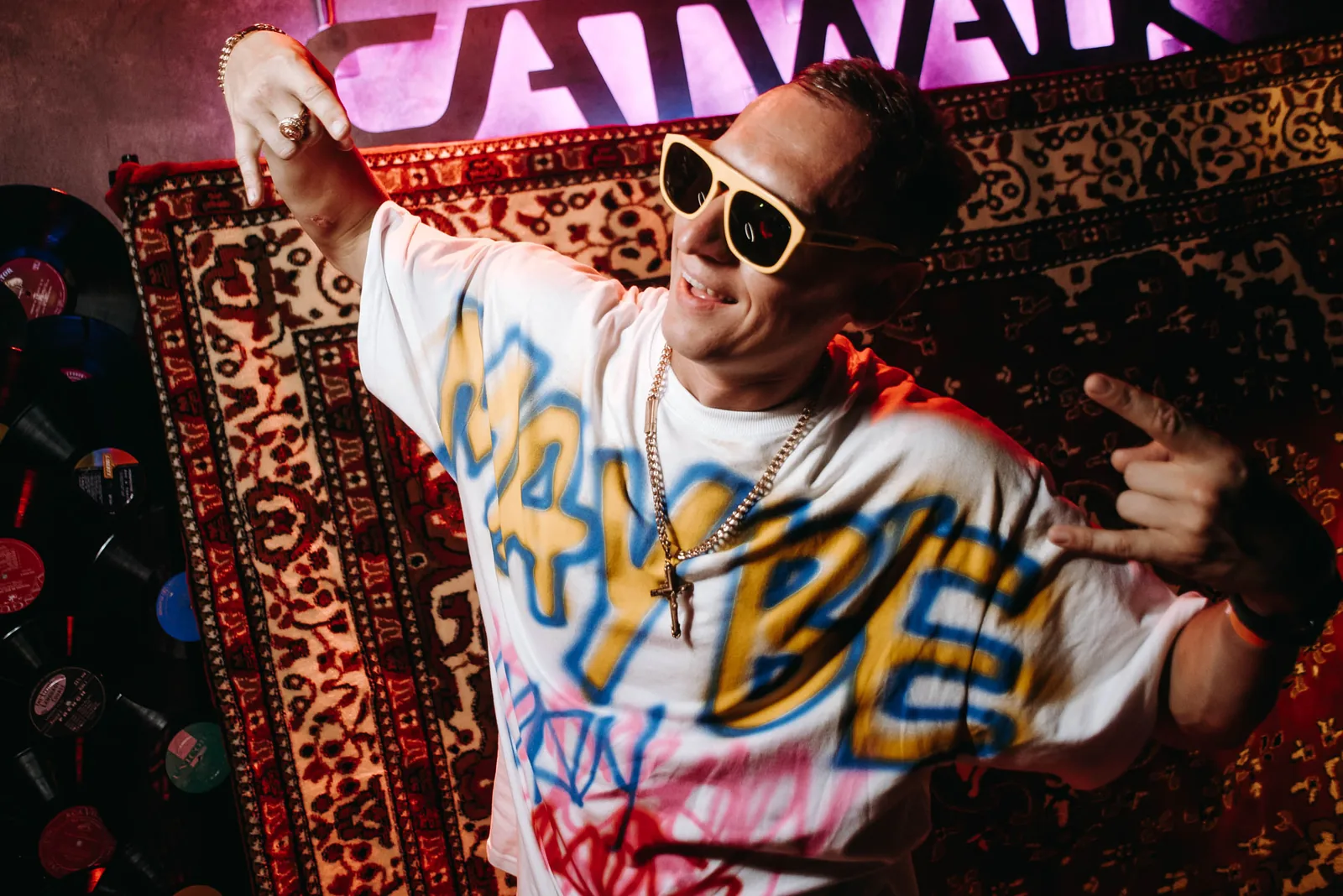 Guests in graffiti outfits at a 90s-themed party, Los Angeles 2023