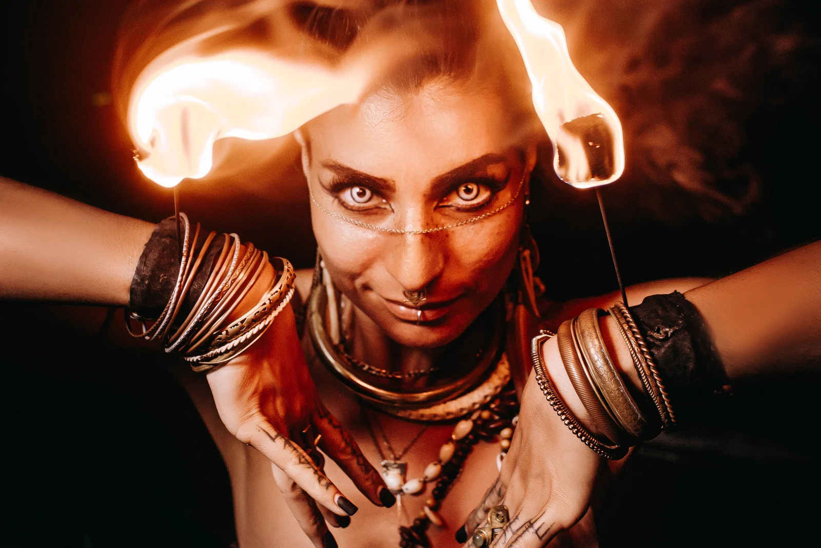 Fire performer close-up with flames