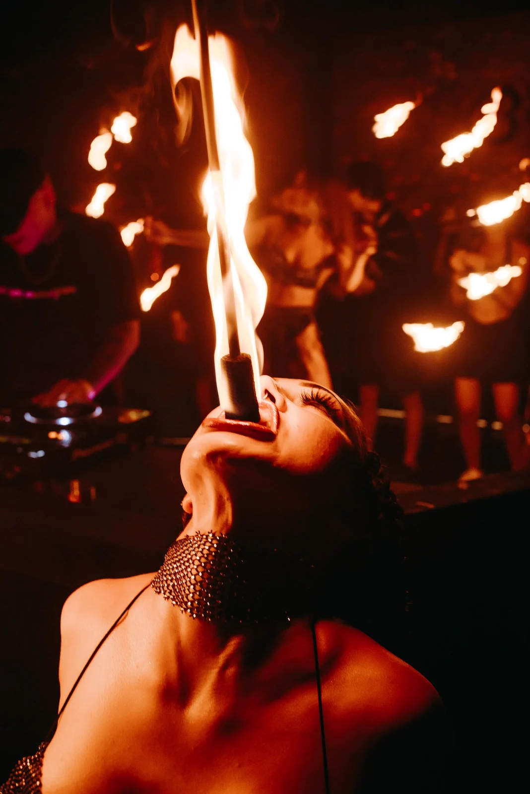 Fire breather performing in the dark