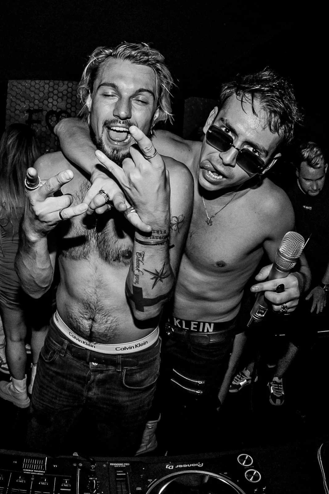 Black-and-white portrait of two friends at a party